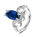 Detail view of sapphire marquise cut ring with silver leaf filigree and crystal accents - Adjustable Open / Sapphire Blue (QHJ004)