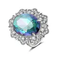 Macro detail of luxury flower ring with oval multicolor mystic topaz stone - Adjustable Open / Rainbow Stone