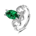 Macro shot of silver adjustable leaf ring with marquise-cut emerald and micro-pave stones - Adjustable Open / Emerald Green (QHJ004)