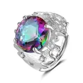 Close-up of rainbow gemstone ring with wavy silver band and sparkling diamond accents - Rainbow Zirconia (QHJ005)