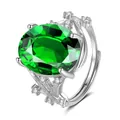 Macro shot of silver ring featuring oval green gemstone and vine texture details - Branch Texture Style / Emerald Green