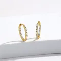 Detailed view of gold plated hoop earrings featuring micro-pave cubic zirconia and radial engraving - 25mm*20mm / Gold