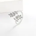 Detail of silver leaf open ring featuring micro-paved white zircons on olive branch - Adjustable Open / White Gold
