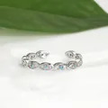 Detailed view of evil eye ring with blue zircons and adjustable silver band - Adjustable Open / Silver