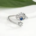 Macro detail of silver adjustable evil eye ring with blue sapphire and pavé diamonds - Adjustable Open / Silver