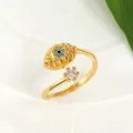 Detailed macro view of gold evil eye open ring with blue stone and star accent - Gold Eye Ring / Gold