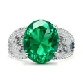 Luxurious silver ring featuring a large oval green gemstone with textured band and diamonds - Adjustable Open / Green Gemstone Style (QHJ008)