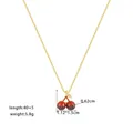 Detailed view of cherry pendant dimensions 1.12x1.5cm on a golden 40+5cm chain - Small Cherry Style (XKN8081) / Gold
