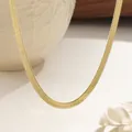 Elegant gold-plated stainless steel flat snake chain necklace on minimalist ceramic decor - Gold Necklace Style (N599) / Gold