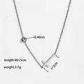 Detail view of silver cross necklace showing dimensions 40+5cm length and 3.7g weight - Steel Cross Necklace (XKN0155)
