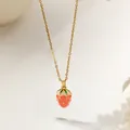 Gold strawberry pendant necklace with pink enamel finish and green leaf detail - Pink Strawberry Style (XKN8280) / Gold