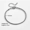 Detail of a 0.25cm wide stainless steel spiral chain necklace with lobster clasp and extension - Steel Color Anklet / Anklet