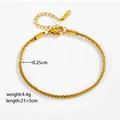 Detail of 0.25cm gold stainless steel chain with lobster clasp and dimension labels - Gold Color Anklet / Anklet