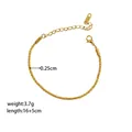 Detailed view of 18K gold plated titanium chain bracelet with lobster clasp and tag - Gold Bracelet