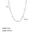 Detail of minimalist bead necklace showing 0.35cm steel balls and 3cm spacing - Round Snake Bead Chain (XKN6090)