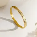 Matte finish gold titanium steel bangle for women featuring polished edges in a minimalist style - Plain Frosted Style (XKB4827)