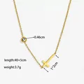 Gold plated titanium steel necklace featuring polished cross and zircon charms - Gold Cross Necklace (XKN0390)
