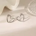 Elegant silver hollow heart-shaped stud earrings made of high-quality titanium steel - Earrings / Twisted Heart Earrings Steel (XKE0206)