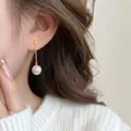 Elegant gold drop earring featuring a white round pearl on a slim chain for women - Gold Bead Pearl Ear Thread / Gold