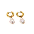 Golden hoop earrings with white baroque pearl pendants featuring a high-polish finish - Baroque Pearl Earrings / Gold