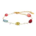 Detail of gold chain bracelet featuring colorful gemstones and white pearls on white background - Multicolor Stone Pearl Bracelet Gold