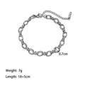 Detail of silver Cuban chain bracelet with lobster clasp, extender, and K18 tag - Steel