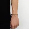 Detail of twisted rope chain necklace in 18K gold finish on a person's neck - Width 6mm-Length 22.86cm / Gold
