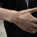Herren Armband aus goldenem gedrehtem Edelstahl Seilkette am Handgelenk - 17cm / 18K-Gold