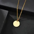 Minimalist gold-plated round tag necklace with slim O-chain on black velvet background - Small Round Disc / Standard Length / 18K Gold