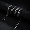 Polished silver stainless steel Cuban link chain necklace with lobster clasp on display - Curb Chain / 7mm Width 50cm Length