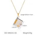Polished stainless steel heart locket necklace with gold loose-leaf hinge detail - Gold & Silver