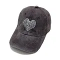Detailed view of dark grey washed denim baseball cap with heart rhinestone embellishment - Coffee