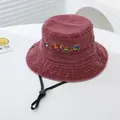 Detailed embroidery of construction vehicles on washed cotton kids bucket hat - 54cm / Burgundy