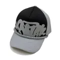 Detail of grey mesh trucker hat with graffiti print and braided rope decoration - Gray