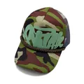 Detail of woodland camo trucker hat featuring 3D puff print and brown rope decor - Camouflage