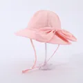 Pink quick-dry sun hat for girls featuring a large bow and adjustable windproof strap - Kids Adjustable / Pink