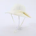 Kids quick-dry wide brim sun hat in pale yellow with a large decorative bow - Kids Adjustable / Off White