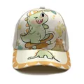 Détail de la casquette dinosaure pour enfant avec motifs sur le bord et tissu crème - Réglable / Beige