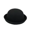 Detail view of the classic black wool felt bowler hat with a rounded crown and rolled brim - Black
