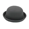 Detailed close-up of dark grey wool felt bowler hat with rolled brim and fine texture - Gray