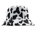 Classic reversible bucket hat with black and white cow print for summer sun protection - Cow Pattern