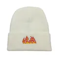 Cream knit beanie with vibrant red and yellow flame embroidery in a streetwear style - One Size / Cream