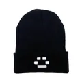 Black Quackity knit beanie featuring white pixel face embroidery and cuffed design - One Size / Black