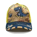 Detail of cartoon dinosaur print and high-quality stitching on yellow kids baseball cap - Adjustable / Umbrella Dinosaur Yellow