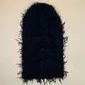 Close-up of black knitted balaclava ski mask with distressed fringe and deconstructed detail - One Size / Black