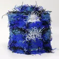 Detailed view of colorful camouflage knit yarn fringe with blue and white textures - One Size / Blue