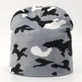 Detail of grey and black camouflage knitted beanie showing the fine texture and fabric - One Size / Gray Camouflage