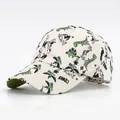 Casquette enfant beige avec motifs dinosaures verts et broderie texte Roar stylée - Style 2 Beige Imprimé All-over / Beige
