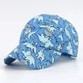 Détail de la casquette bleue pour enfants avec broderie dinosaure et visière courbée - Style 3 Bleu Imprimé All-over / Bleu