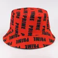 Close-up of red cotton bucket hat with black vertical PRIME letter print and twill texture - One Size 58cm / Orange Red
